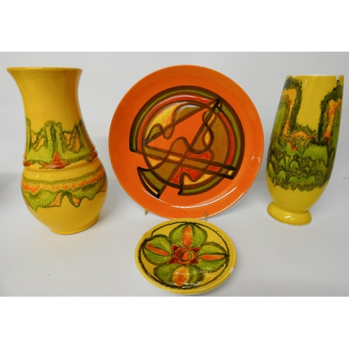 532 - Four pieces of Poole pottery Delphis ware to include pin tray, charger and a pair of vases