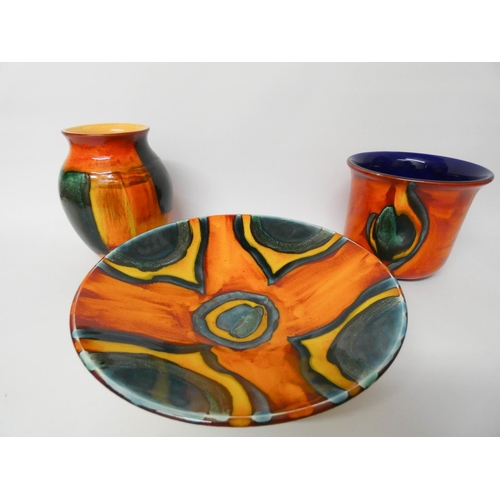 535 - Three pieces of modern Poole pottery to include vase, jardinière and shallow fruit bowl