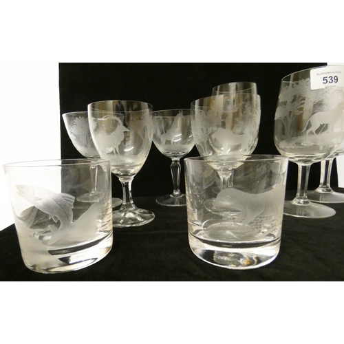 539 - A collection of Rowland Ward engraved glass ware to include a set of four wine glasses and two tumbl... 