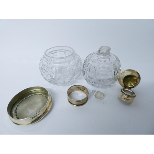 601 - Two cut glass and silver mounted dressing table jars and a napkin ring