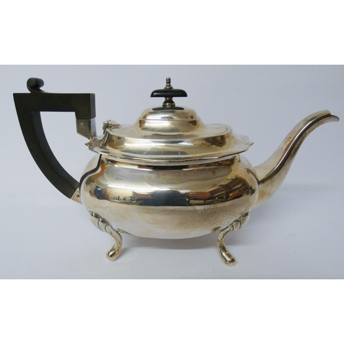 602 - A silver teapot by Walker & Hall, gross weight 23ozs troy