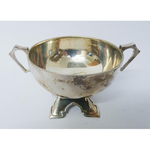 603 - A hallmarked silver Arts & Crafts style twin handled sugar basin by Walker & Hall, gross weight 6.5 ... 