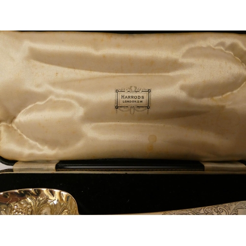 607 - A pair of George III silver berry spoons in Harrods fitted box