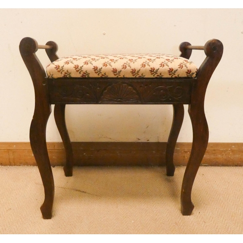 21 - An Edwardian Walnut music stool with tapestry seat