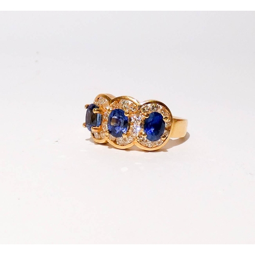 675 - A quality modern sapphire and diamond triple cluster ring, of three large oval sapphires of good col... 