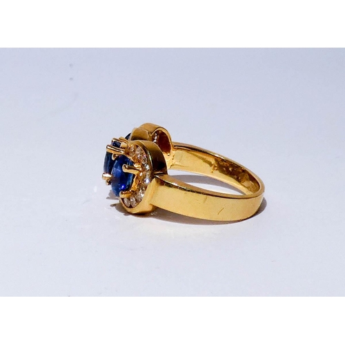 675 - A quality modern sapphire and diamond triple cluster ring, of three large oval sapphires of good col... 