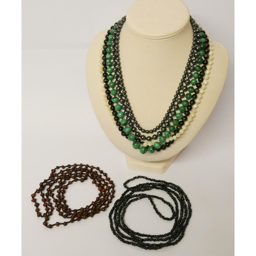 599 - Several strings of beads - malachite, haematite, tigers eye etc