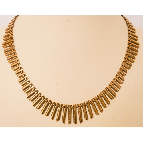 631 - A 9ct yellow gold fringe necklace, gross weight 34 grams