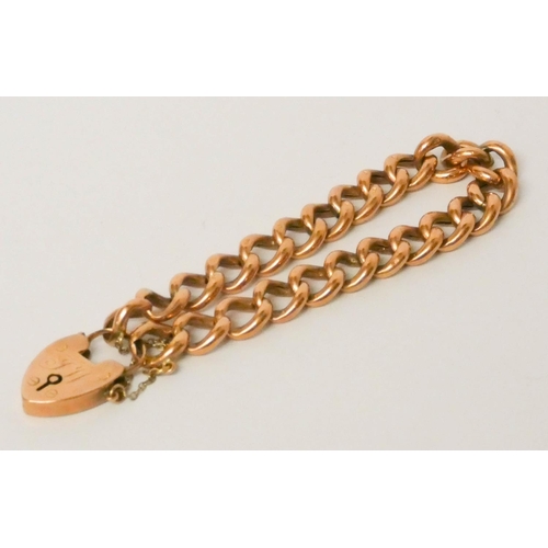 658 - Edwardian 9ct rose gold curb link chain bracelet with heart shaped padlock fastening. Heart engraved... 