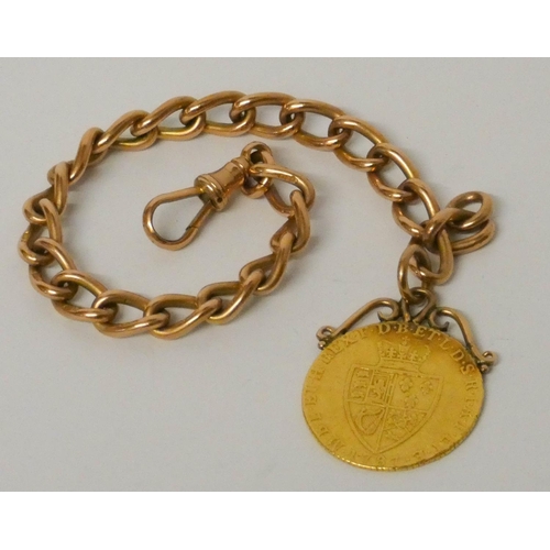 668 - George III Spade Guinea  mounted as a pendant attached to a 19th century 9ct rose gold curb chain wi... 