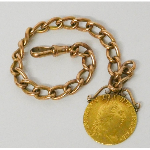 668 - George III Spade Guinea  mounted as a pendant attached to a 19th century 9ct rose gold curb chain wi... 