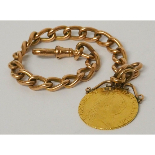 668 - George III Spade Guinea  mounted as a pendant attached to a 19th century 9ct rose gold curb chain wi... 