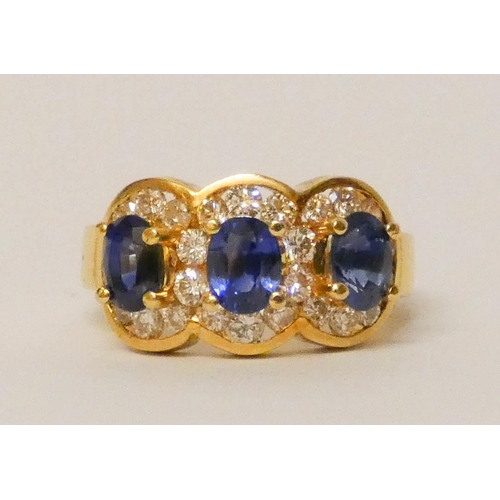 675 - A quality modern sapphire and diamond triple cluster ring, of three large oval sapphires of good col... 