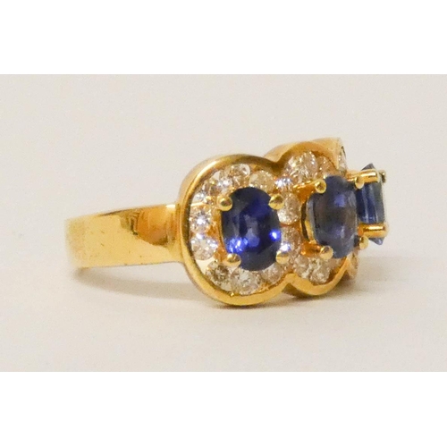 675 - A quality modern sapphire and diamond triple cluster ring, of three large oval sapphires of good col... 