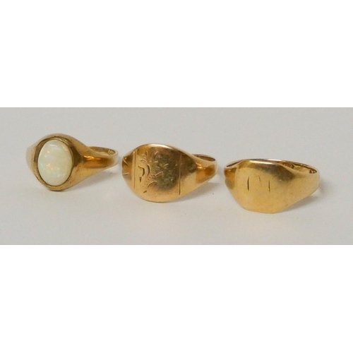 677 - Two 9ct gold signet rings and an opal set signet ring. Gross weight 4.5 grams, all size G