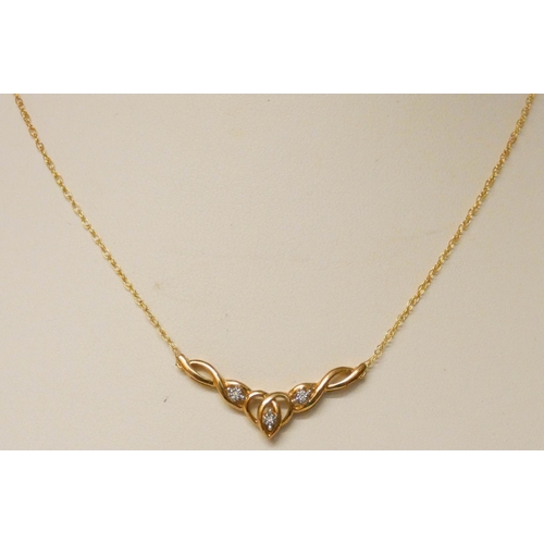 681 - Modern 9ct gold and diamond pendant, on fine gold chain.