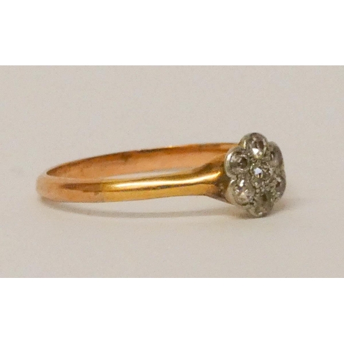 689 - Edwardian diamond flower cluster ring, on yellow gold shank. Not hallmarked, ring size L