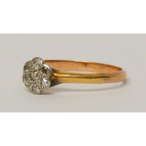 689 - Edwardian diamond flower cluster ring, on yellow gold shank. Not hallmarked, ring size L