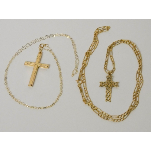 690 - 9ct gold Celtic design cross pendant on gold chain and another cross pendant on fine chain. Gross we... 