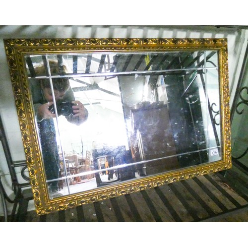 136 - A Victorian style mirror in gilt frame