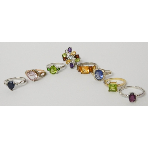 573 - A collection of ladies stone set silver and silver gilt dress rings.