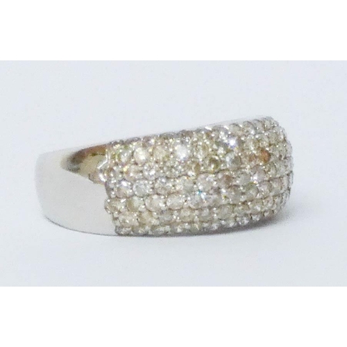 628 - A pave diamond half hoop band, in 18ct white gold. Hallmarked, ring size M