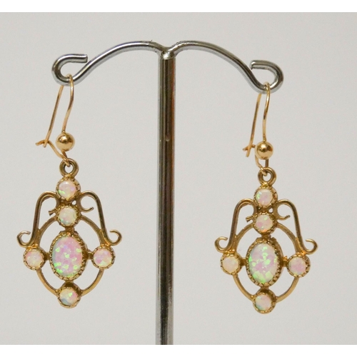 650 - A pair of Edwardian design opal drop earrings, in 9ct yellow gold.