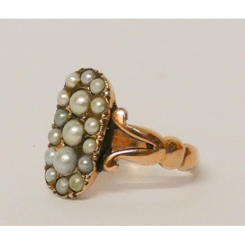 651 - Antique pearl panel ring, the oval closed back panel set with split pearls, all in rose gold. Size L