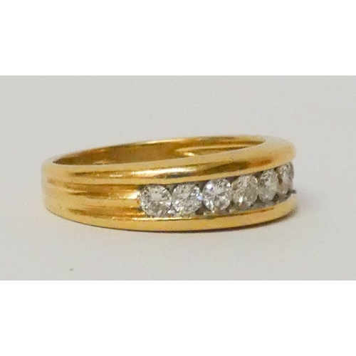 663 - 18ct yellow gold half hoop eternity ring, channel set with 10 brilliant cut diamonds, total diamond ... 