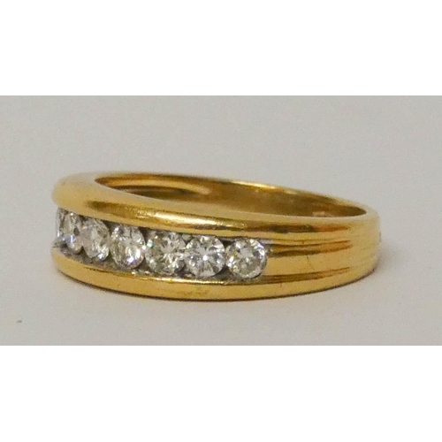 663 - 18ct yellow gold half hoop eternity ring, channel set with 10 brilliant cut diamonds, total diamond ... 