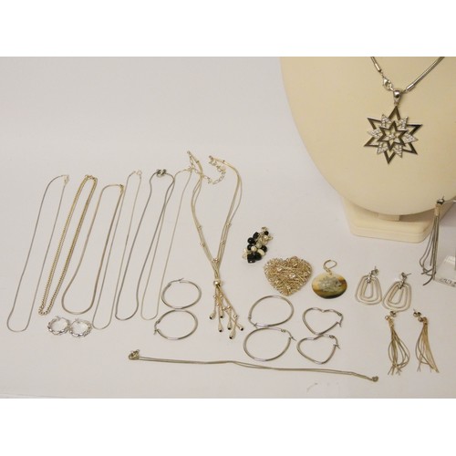 566 - Silver jewellery to include chains, CZ set pendants, earrings etc