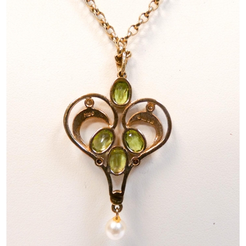 665 - An Edwardian design peridot and diamond pendant with pearl dropper, hallmarked 9ct, on a 9ct yellow ... 