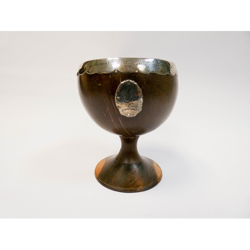 450 - An 18th century coconut cup, with silver rim and mount, inscribed Thomas Mathieson 27th December 179... 