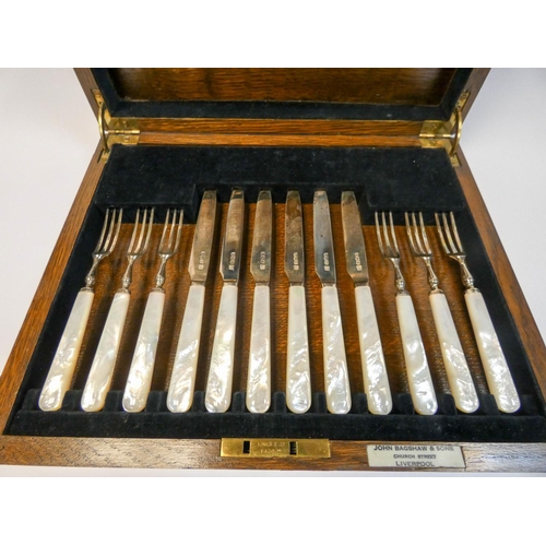 602 - A set of six cased silver and mother of pearl handled pastry knives & forks. Sheffield hallmarks