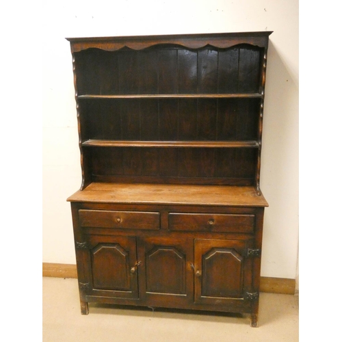 56 - An oak dresser with shelf back, drawers and cupboards under, 4' wide