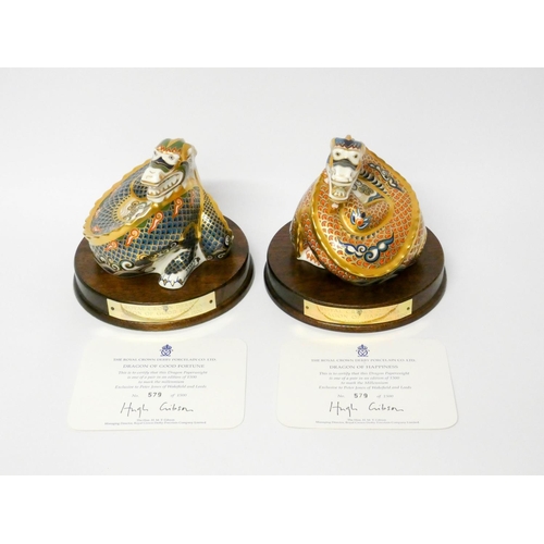 516 - Royal Crown Derby, a pair of Millennium Dragon paperweights, 'The Dragon of Happiness' and 'The Drag... 