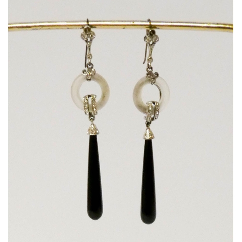 638 - A pair of Art Deco style drop earrings and a silver plaited link bracelet