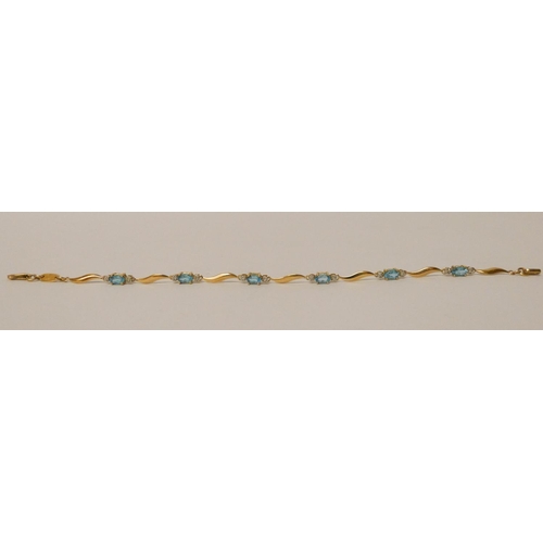 648 - 9ct yellow gold diamond and blue topaz bracelet, gross weight 3 grams 18 cms long