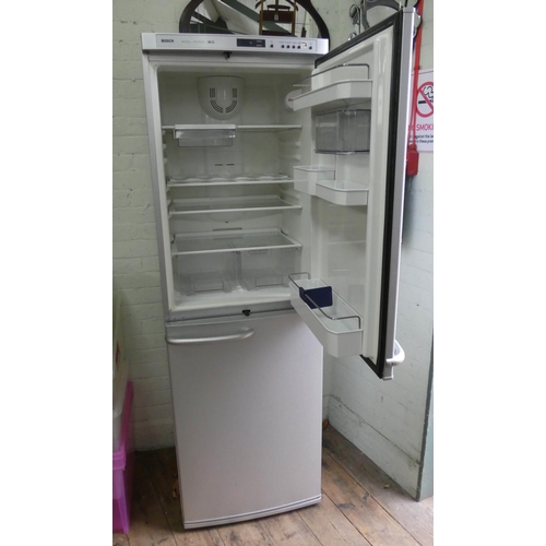 705 - A Bosch Active No Frost fridge/freezer, 6' tall in silver case