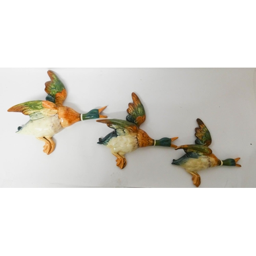 509 - A set of three Beswick retro wall mounting flying ducks, numbered 5961