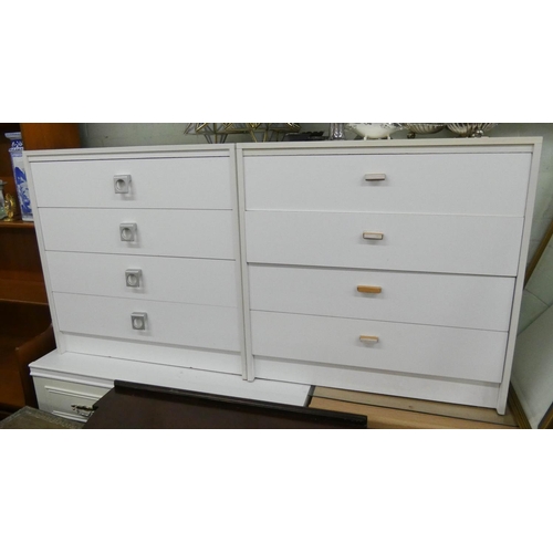 16 - A pair of modern white chests each fitted four drawers