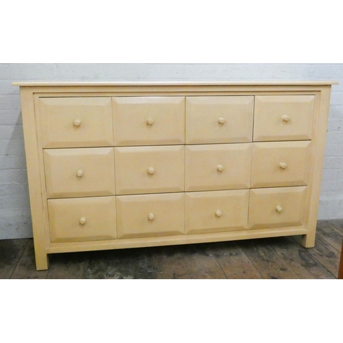 51 - A modern cream chest of twelve drawers with crackle ware finish, 5' wide