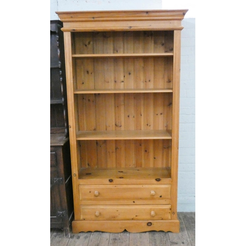 60 - A modern pine open bookcase with two long drawers under, 3' wide