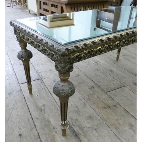 82 - A long gilt framed coffee table with inset mirrored top