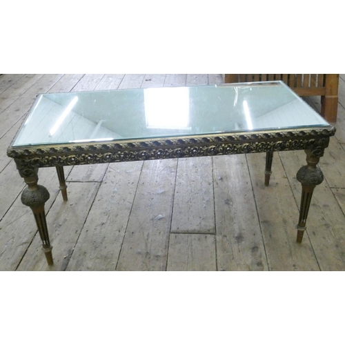 82 - A long gilt framed coffee table with inset mirrored top