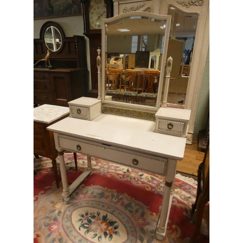 102 - A white painted and gilt decorated dressing table with swing mirror, drawer under on turned legs, 3'... 