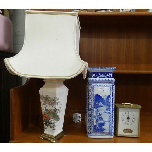 12 - Oriental style china table lamp with shade, blue and white china vase and a brass cased clock