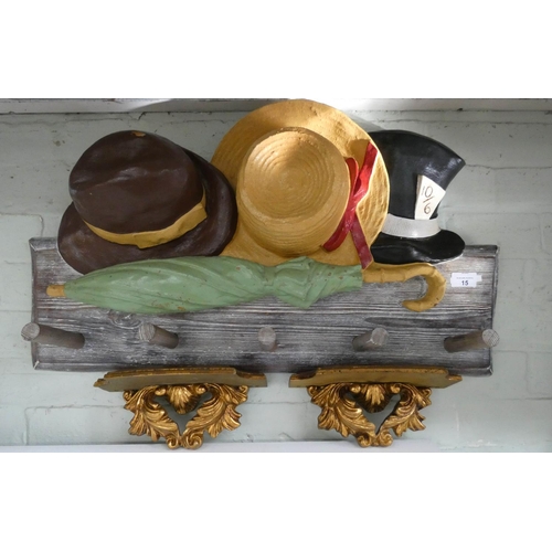 15 - A hat decorated painted coat rack and a pair of gilt wall brackets