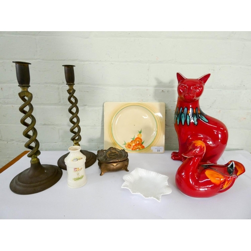 33 - Poole pottery cat, duck, pair of twist column brass candlesticks, Bizarre sandwich plate, trinket bo... 