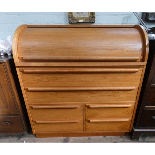 34 - A modern teak cylinder top bureau with drawers under, 3' wide